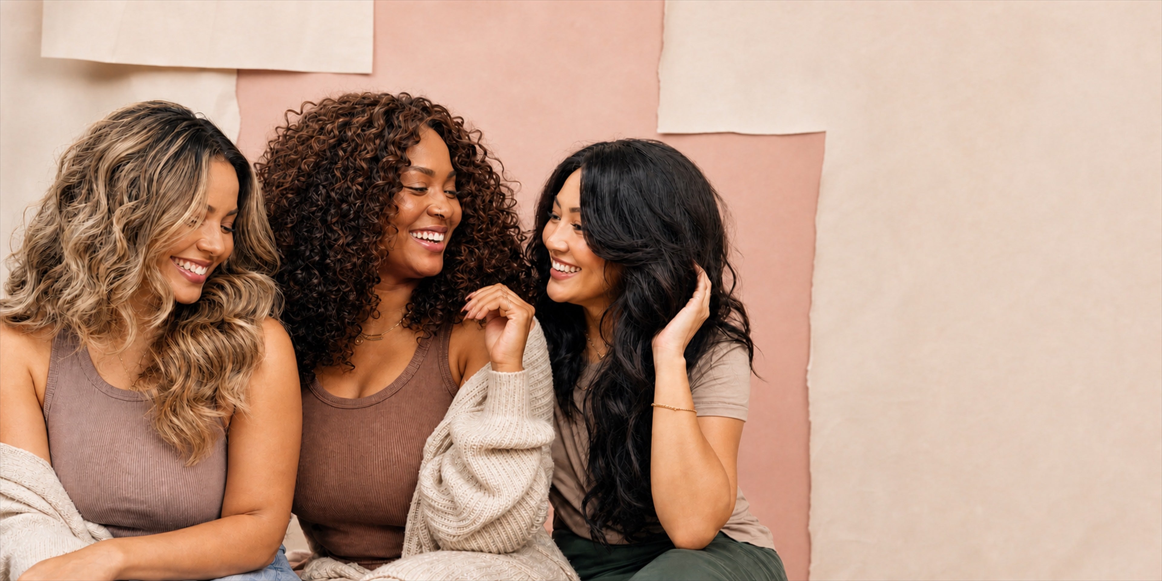 Three women sharing a joyful Dreamlover moment